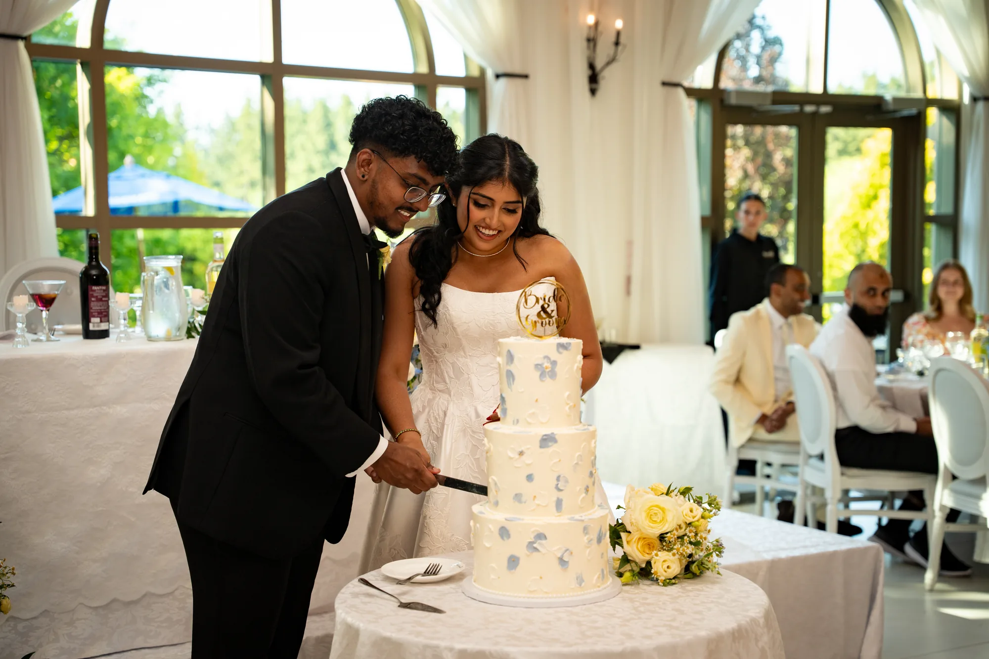 Sarika and Saran cake cutting photographed by SA Production Media