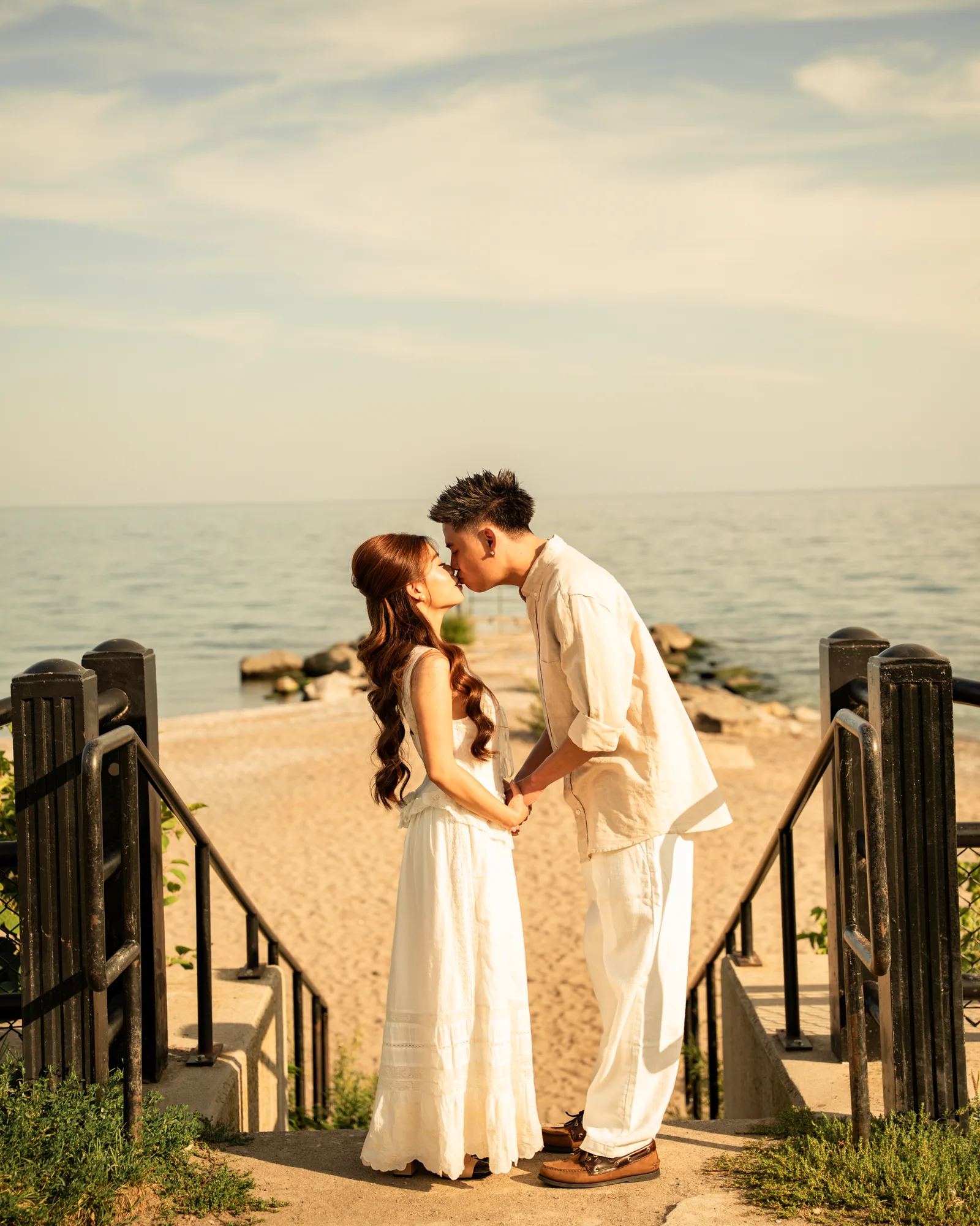 Zar and John waterfront engagement portrait photographed by SA Production Media