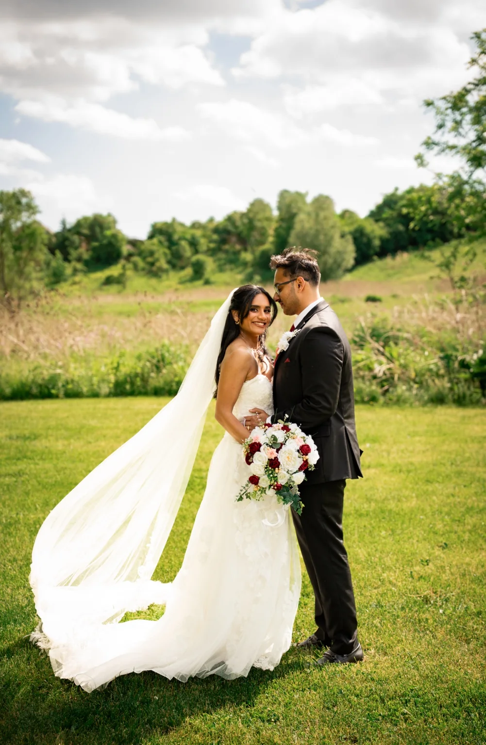 Bride and groom outdoor wedding portrait